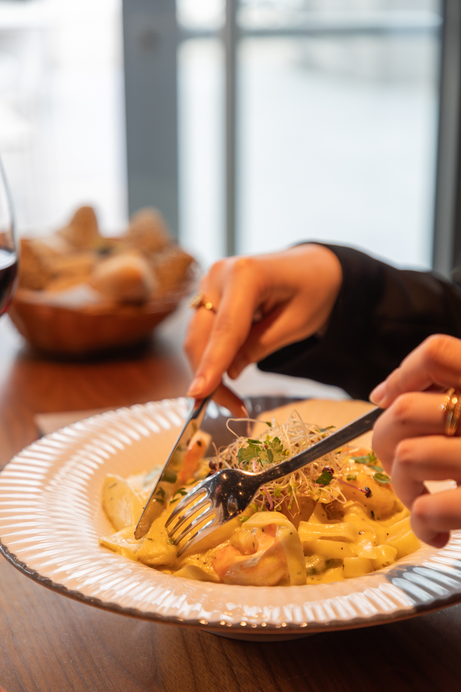 Girl eating pasta